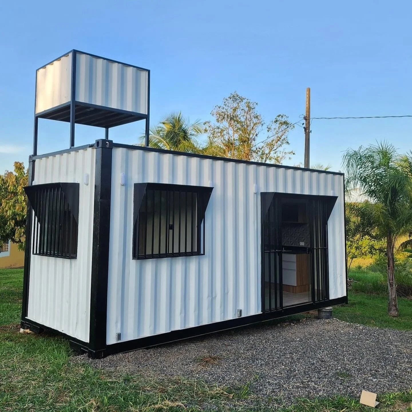 Custom 20ft Shipping Container Home With Water Tank image 0